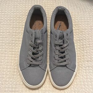 Brand new, never been worn gray men’s sneakers, size 10.5